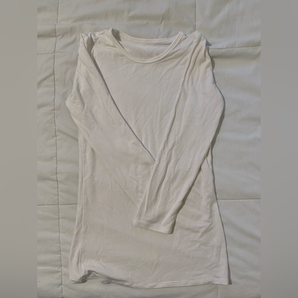 Small, long sleeve, white, shirt.